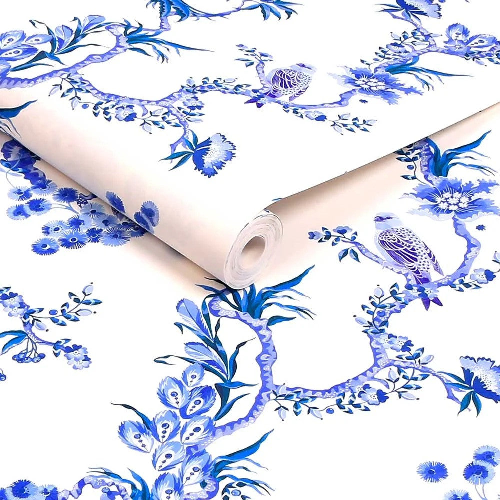 Birds & Berries wallpaper in Blue by Natty & Polly, styled in an interior