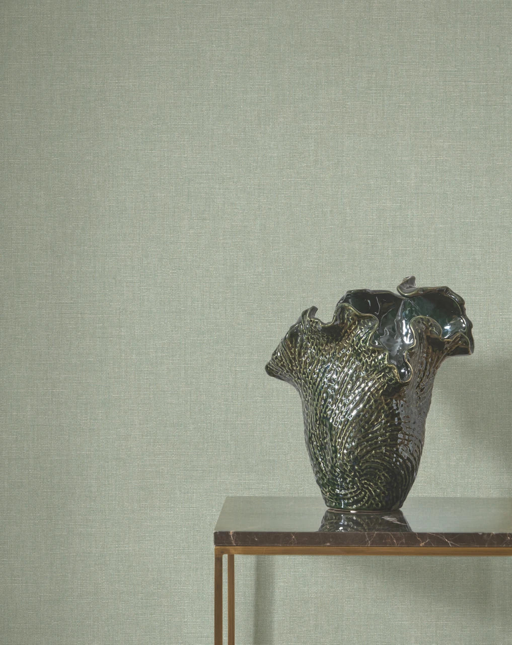 Caractère wallpaper in Celadon by Natty & Polly, styled in a living room