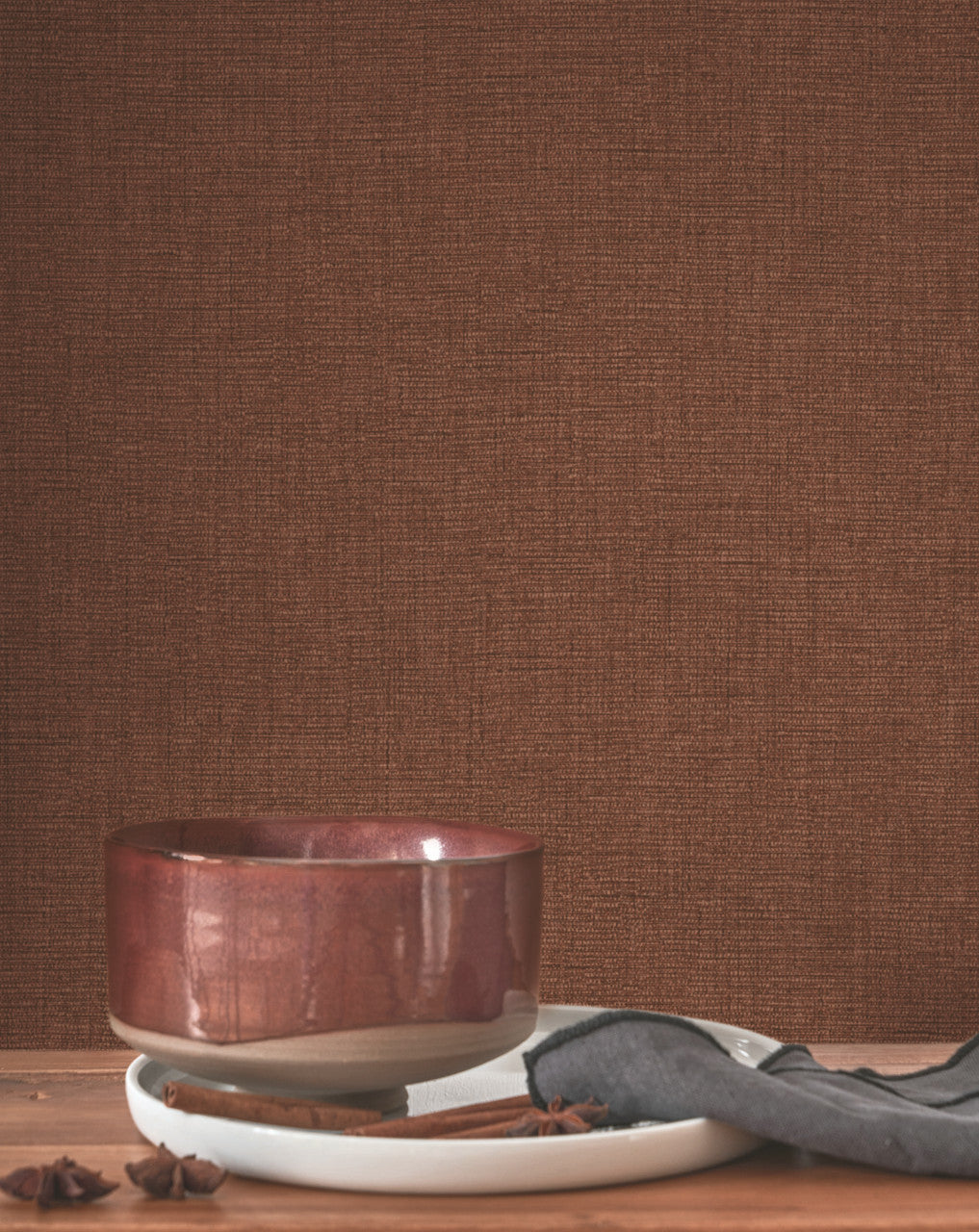 Caractère wallpaper in Hazelnut by Natty & Polly, styled in a living room