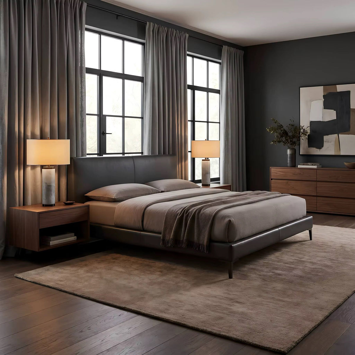 White quartz Serra table lamps styled in a dark walnut and charcoal bedroom