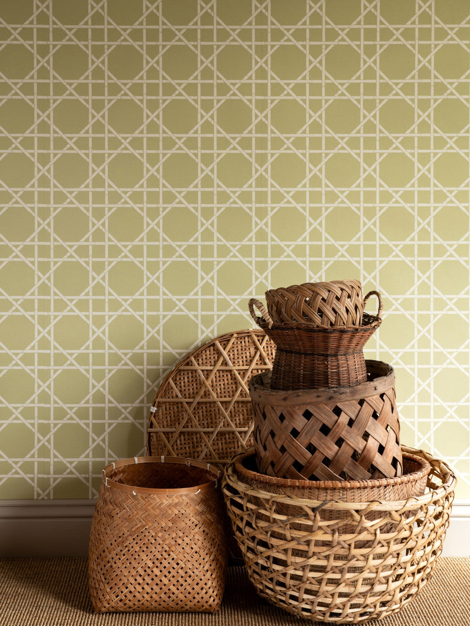 Trellis wallpaper in Dusty Lemon by Natty & Polly, styled in an interior