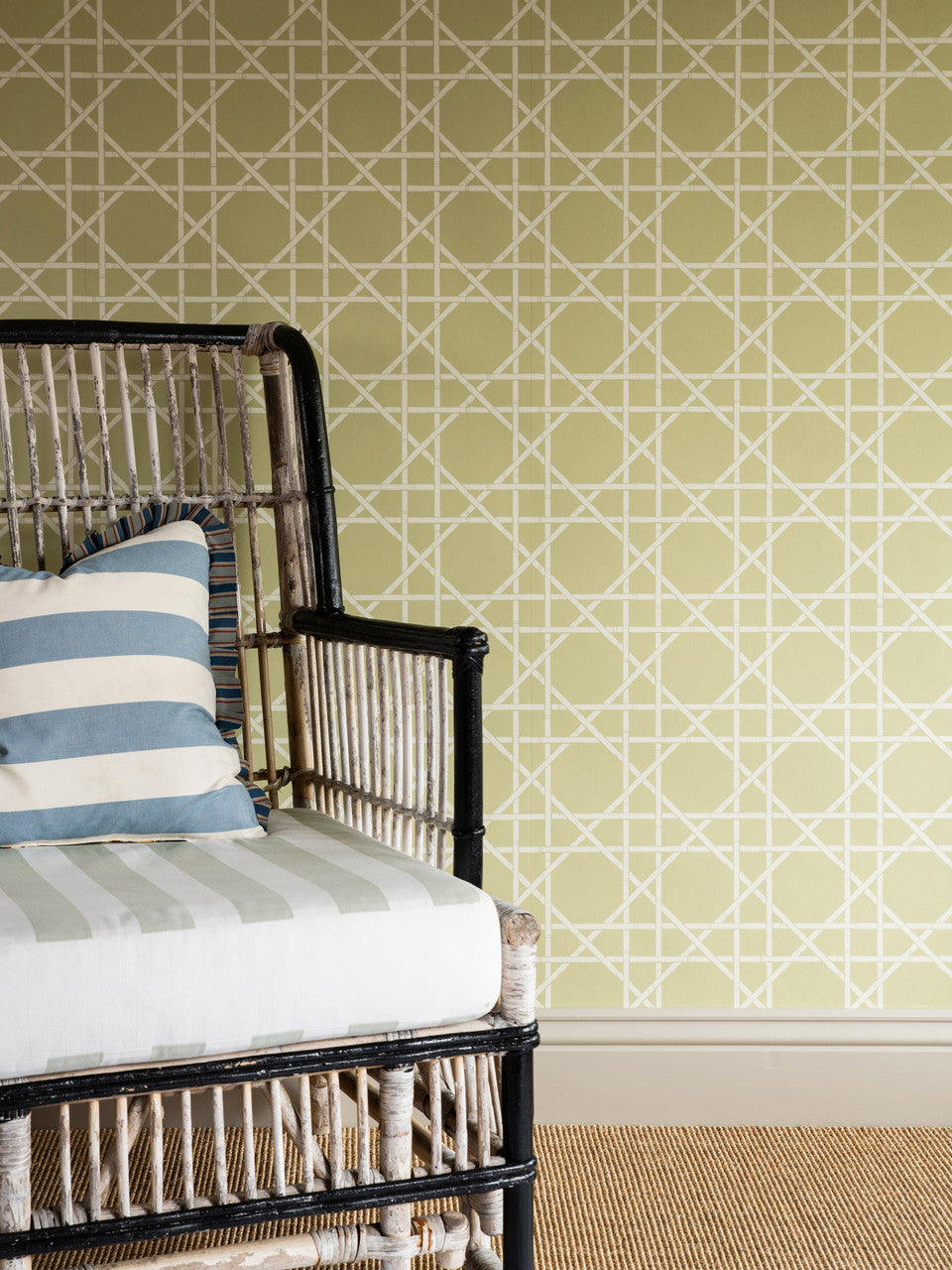 Trellis wallpaper in Dusty Lemon by Natty & Polly, styled in an interior