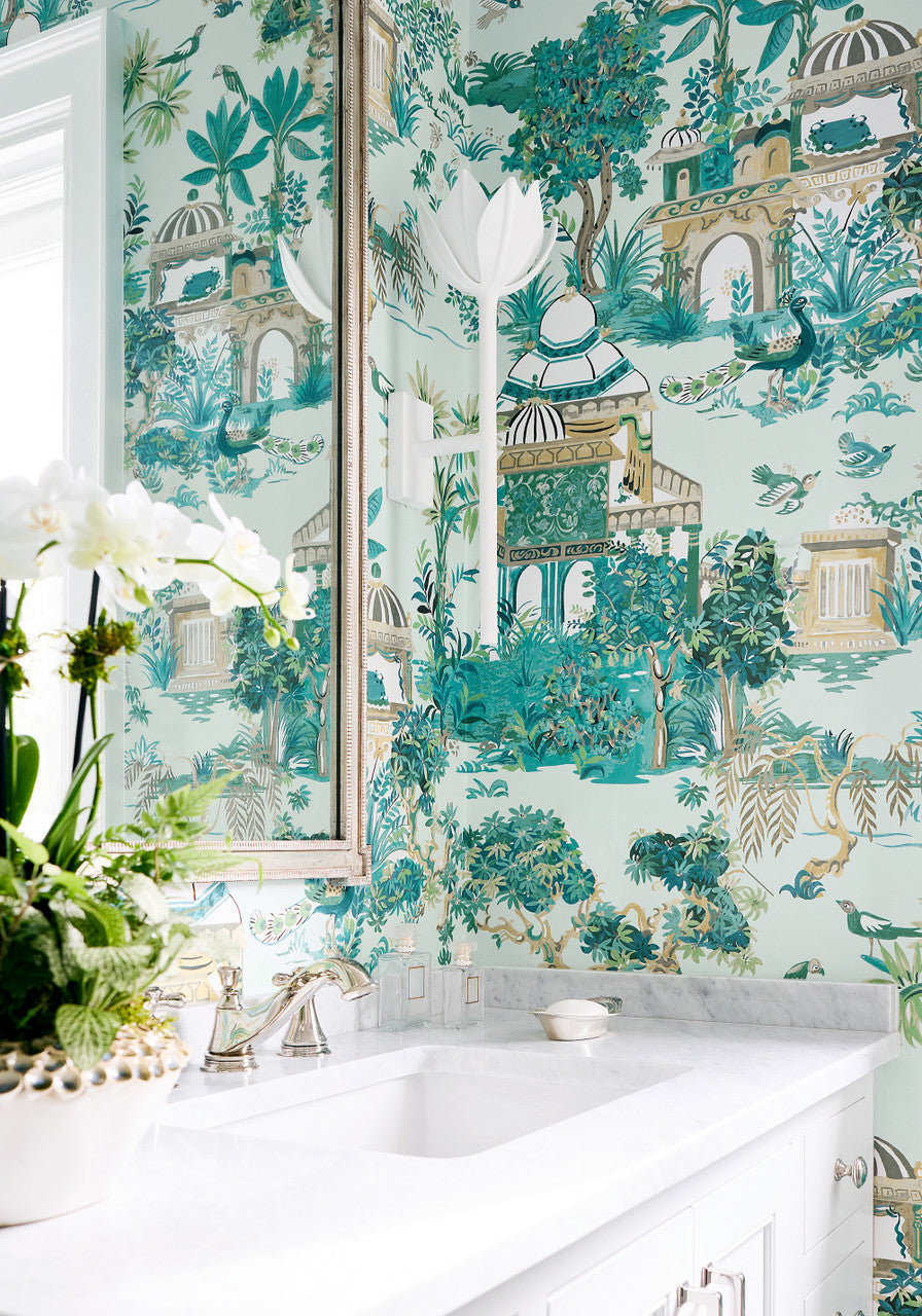 Mystic Garden wallpaper in Spa Blue by Natty & Polly, styled in an interior
