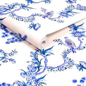 Birds & Berries wallpaper in Blue by Natty & Polly, styled in an interior