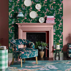 Birds & Berries wallpaper in Emerald by Natty & Polly, styled in an interior
