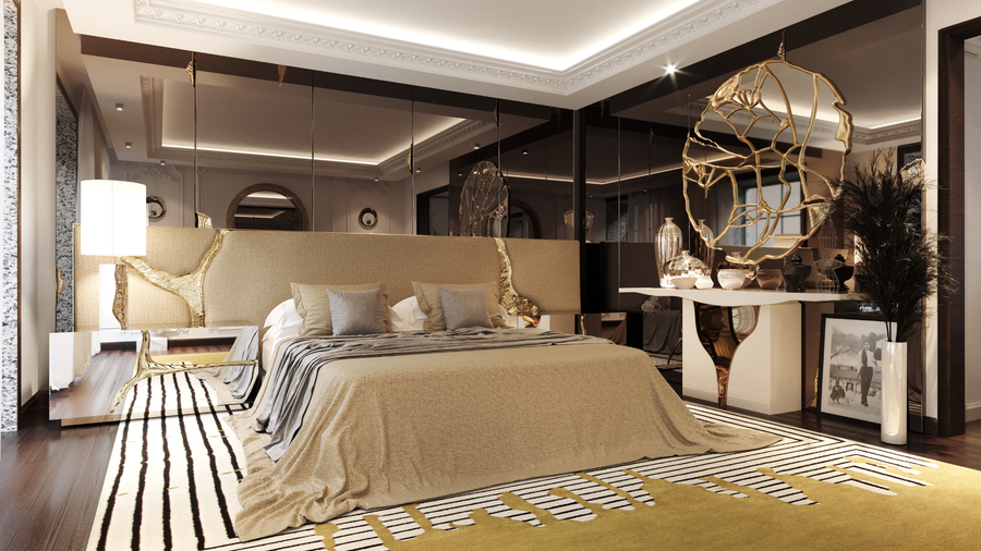 Bedroom with gold leaf bed frame and sculptural mirror