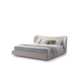 Maison Debrah Avenisse seamless fully upholstered fabric bed on slim matte black legs