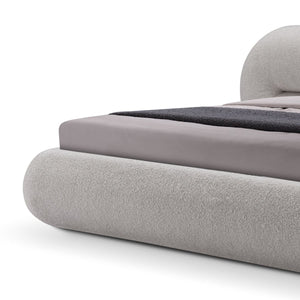 Maison Debrah Calyx sculpted fully upholstered bed on black lacquered metal legs — view 3