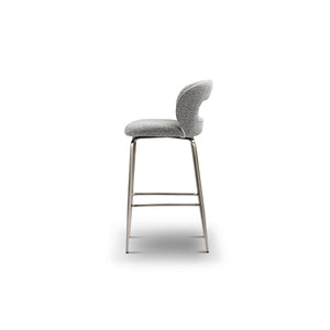 Maison Debrah Estrin grey bouclé bar chair with open-back cutout and brushed bronze frame — view 3