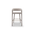 Maison Debrah Gresta bar stool in warm grey fabric with curved back and brushed copper legs