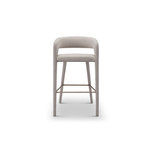 Maison Debrah Gresta bar stool in warm grey fabric with curved back and brushed copper legs