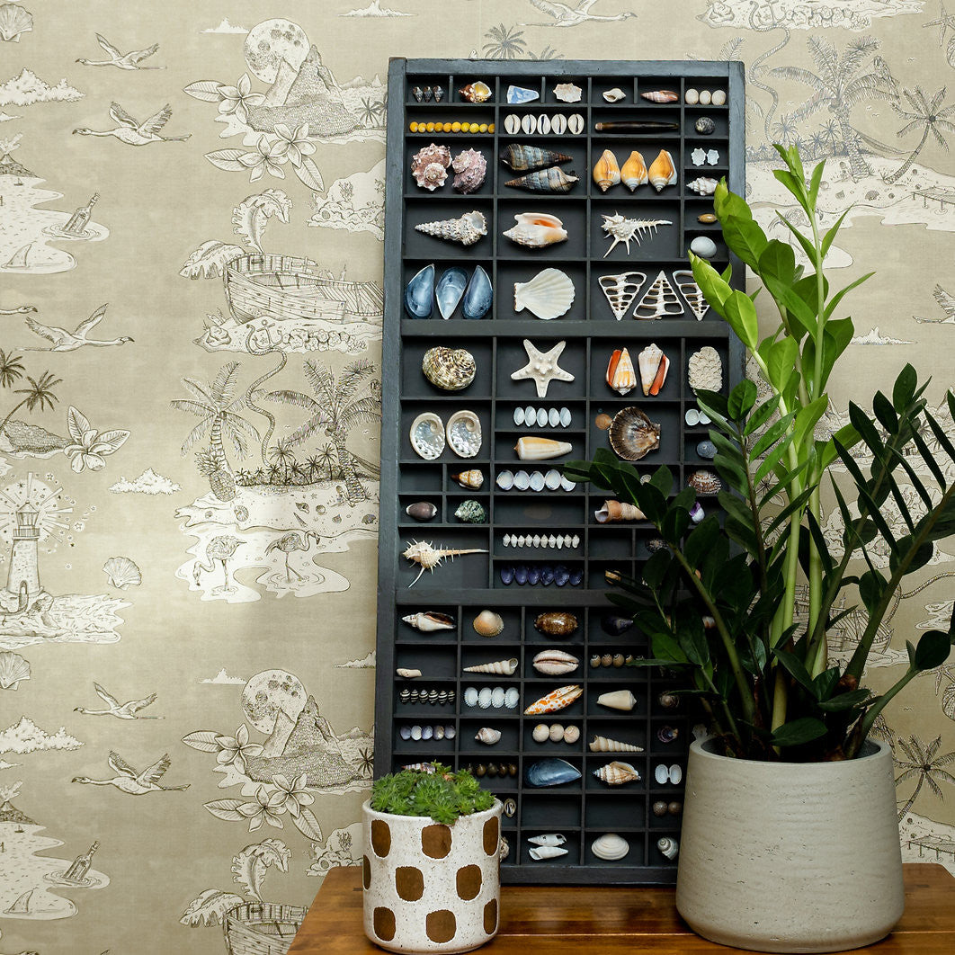 Castaway wallpaper in Greige by Natty & Polly, styled in an interior