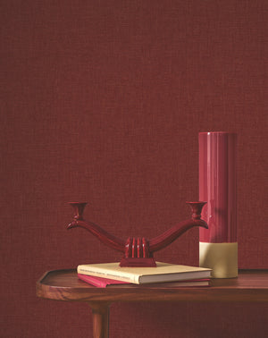 Caractère wallpaper in Amarena by Natty & Polly, styled in a living room