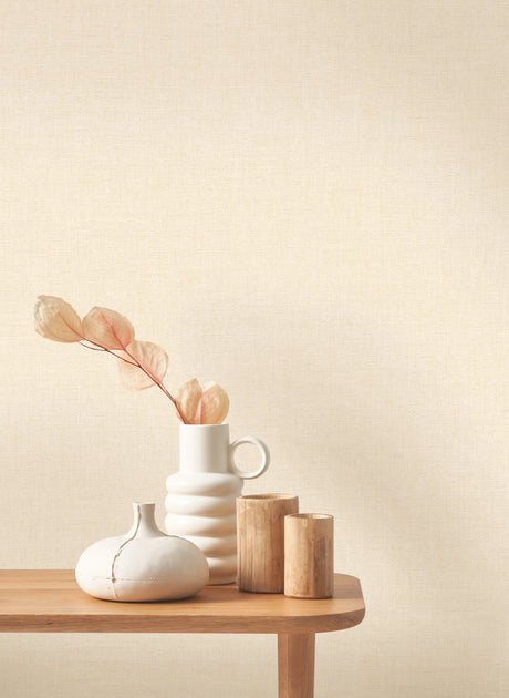 Caractère wallpaper in Beige Cream by Natty & Polly, styled in a living room