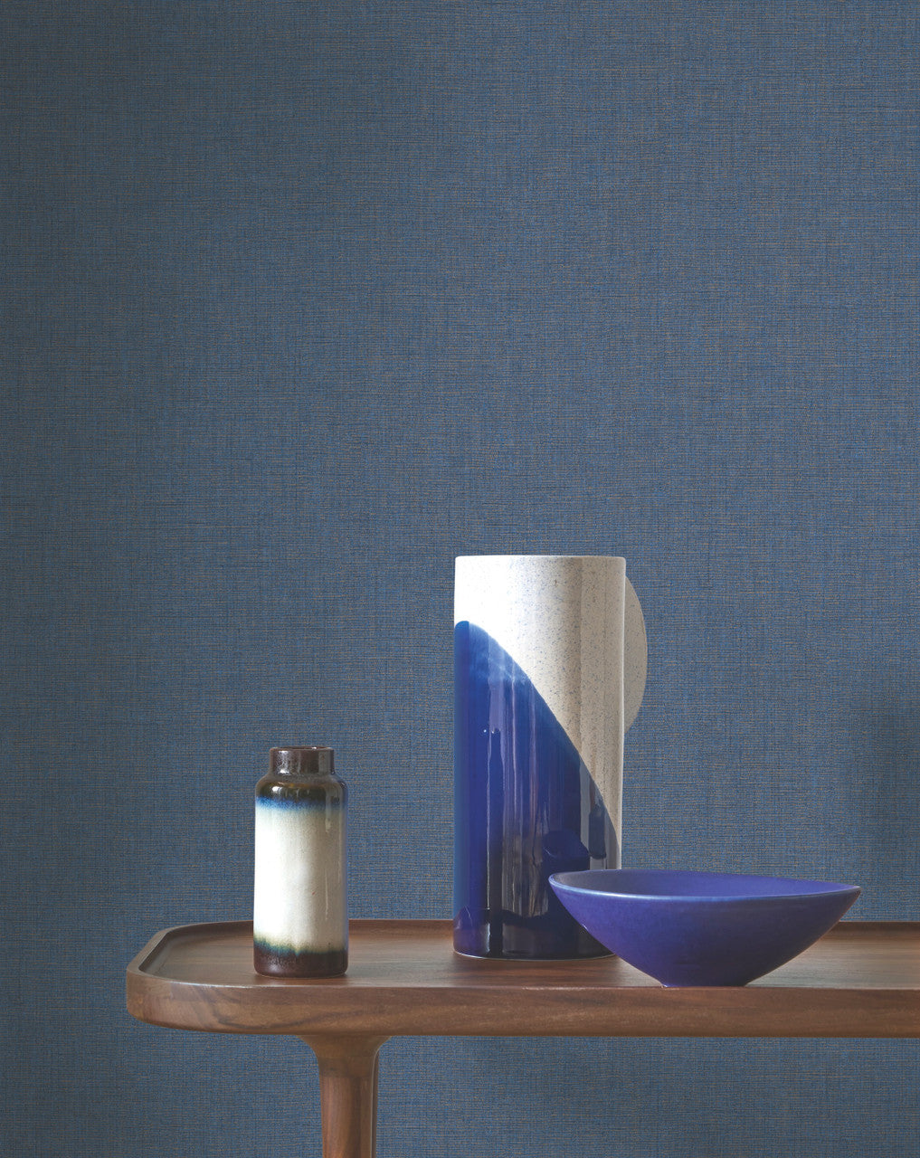 Caractère wallpaper in Denim Blue by Natty & Polly, styled in a living room