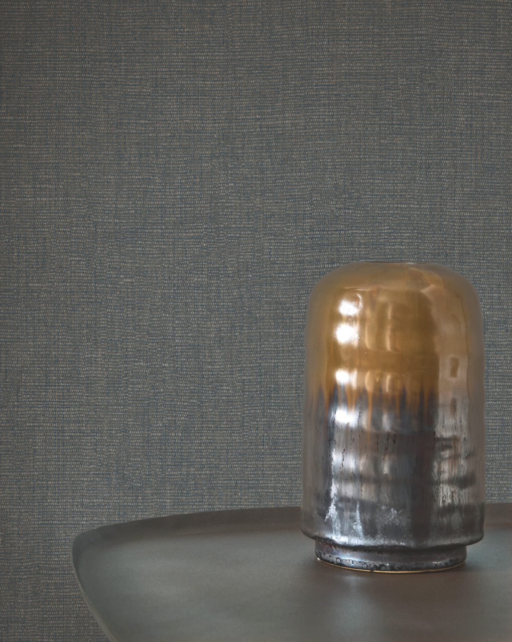 Caractère wallpaper in Slate Grey by Natty & Polly, styled in a living room