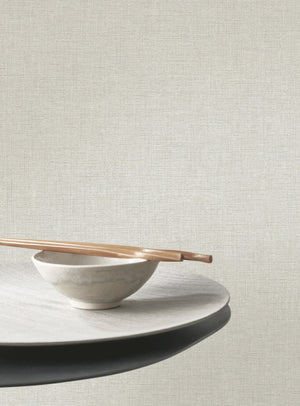 Caractère wallpaper in Feather Grey by Natty & Polly, styled in a living room
