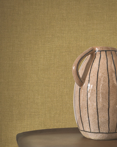 Caractère wallpaper in Olive by Natty & Polly, styled in a living room