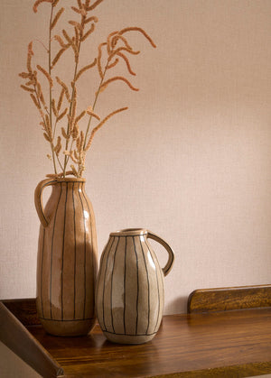 Caractère wallpaper in Blush Pink by Natty & Polly, styled in a living room