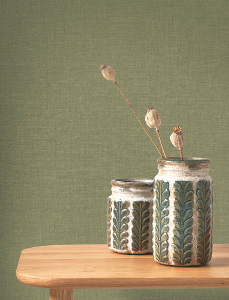 Caractère wallpaper in Leaf Green by Natty & Polly, styled in a living room