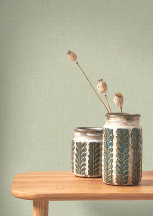 Caractère wallpaper in Opal Green by Natty & Polly, styled in a living room
