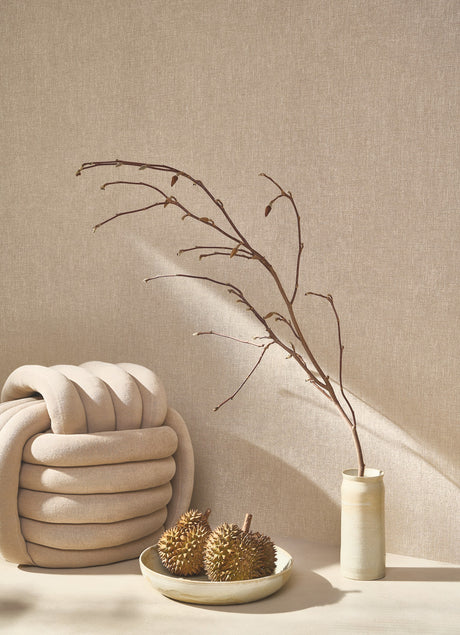 Caractère wallpaper in Taupe by Natty & Polly, styled in a living room