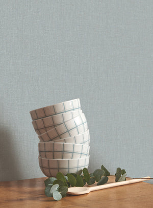 Caractère wallpaper in Horizon Blue by Natty & Polly, styled in a living room
