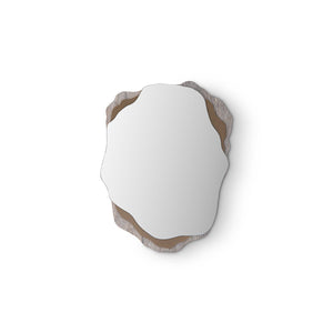 Maison Debrah Brelis undulating wall mirror layered over beige marble and brass panels