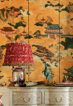 Floating World wallpaper in Golden Yellow by Natty & Polly, styled in an interior