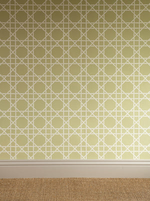 Trellis wallpaper in Dusty Lemon by Natty & Polly, styled in an interior