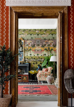 Peace and Music wallpaper in Multi by Natty & Polly, styled in an interior