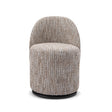 Maison Debrah Wovren swivel barrel chair in warm multi-tone cream bouclé on matt black base
