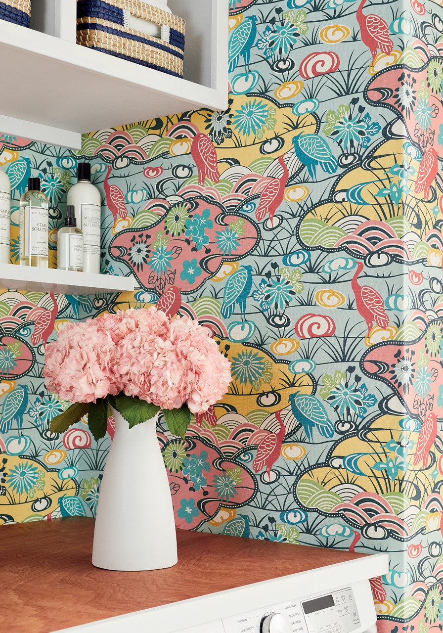 Heron Stream wallpaper in Coral / Aqua by Natty & Polly, close-up of the pattern and texture