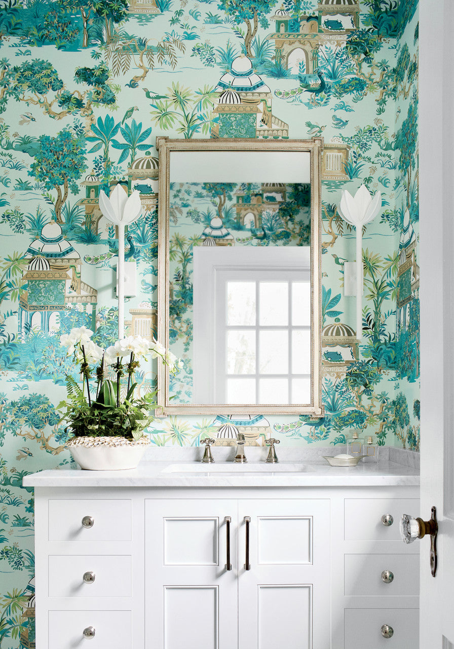 Mystic Garden wallpaper in Spa Blue by Natty & Polly, styled in an interior