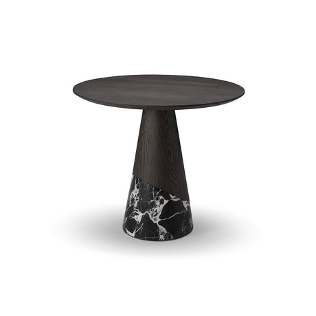 Maison Debrah Vallauris round dining table with dark grey elm top and black marble base
