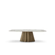 Maison Debrah Gralor oval white marble dining table on a lobed brass pedestal base