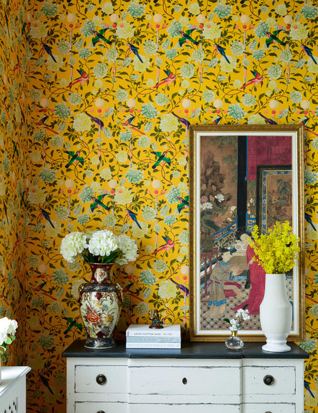 The Garden of Immortality wallpaper in Yellow by Natty & Polly, styled in an interior