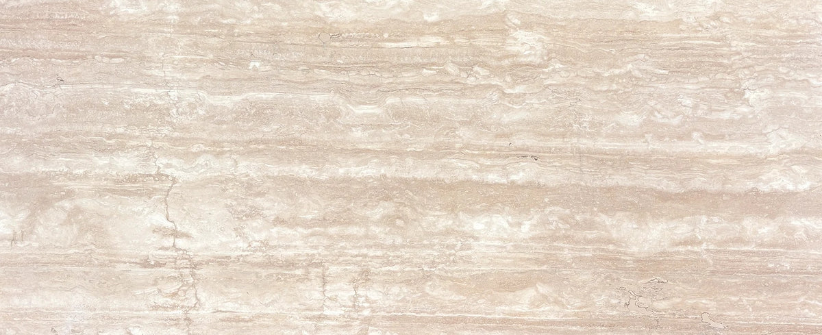 Natural honed travertine slab with ivory and blush-beige banding for Cascadia Bullnose table