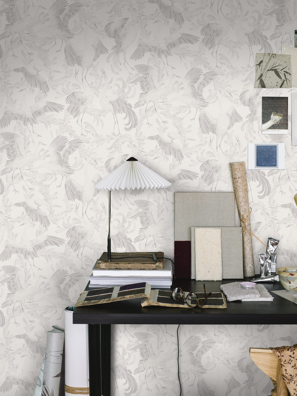 Dancing Crane wallpaper in White / Neutrals by Natty & Polly, styled in an interior