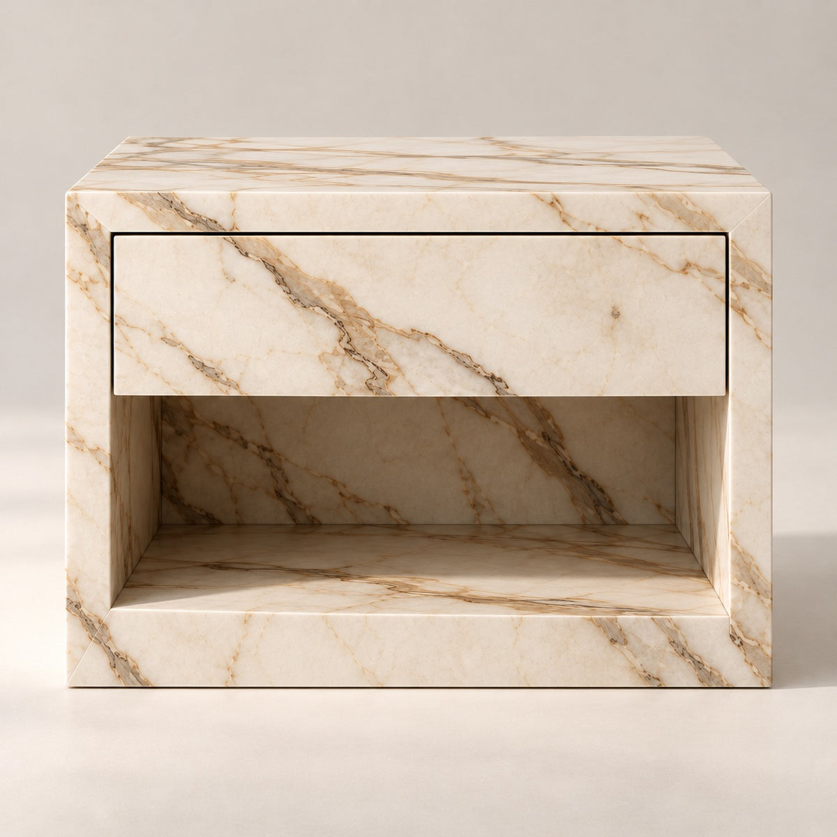 Front view of the Evalina marble bedside table with push-to-open drawer and open shelf