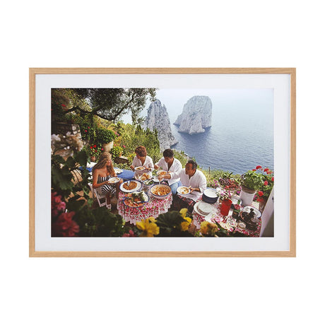 Dining Al Fresco On Capri by Slim Aarons | Framed Photographic Print, Fine Print Co, 195 x 290 mm, Photographic Paper, Scandi Frame