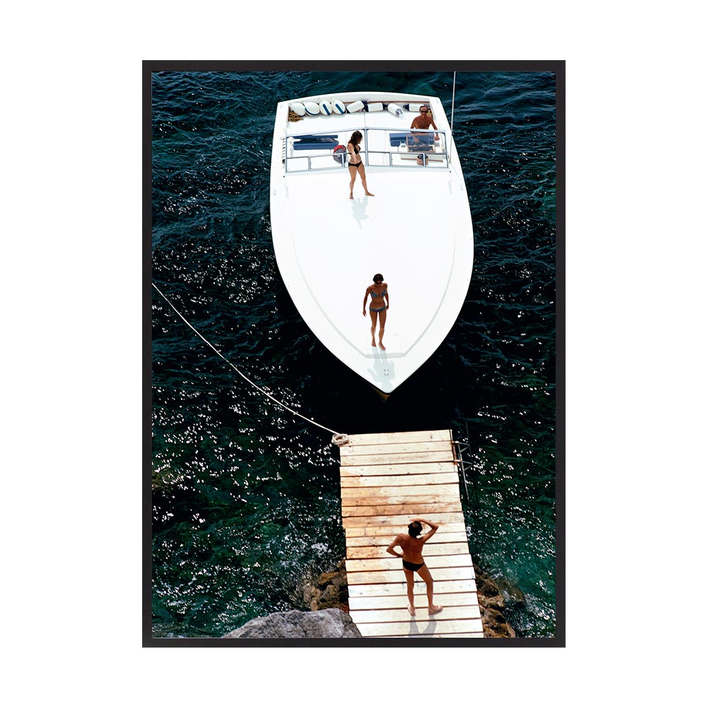 Speedboat Landing by Slim Aarons | Framed Photographic Print, Fine Print Co, 490 x 730 mm, Canvas, Black Frame